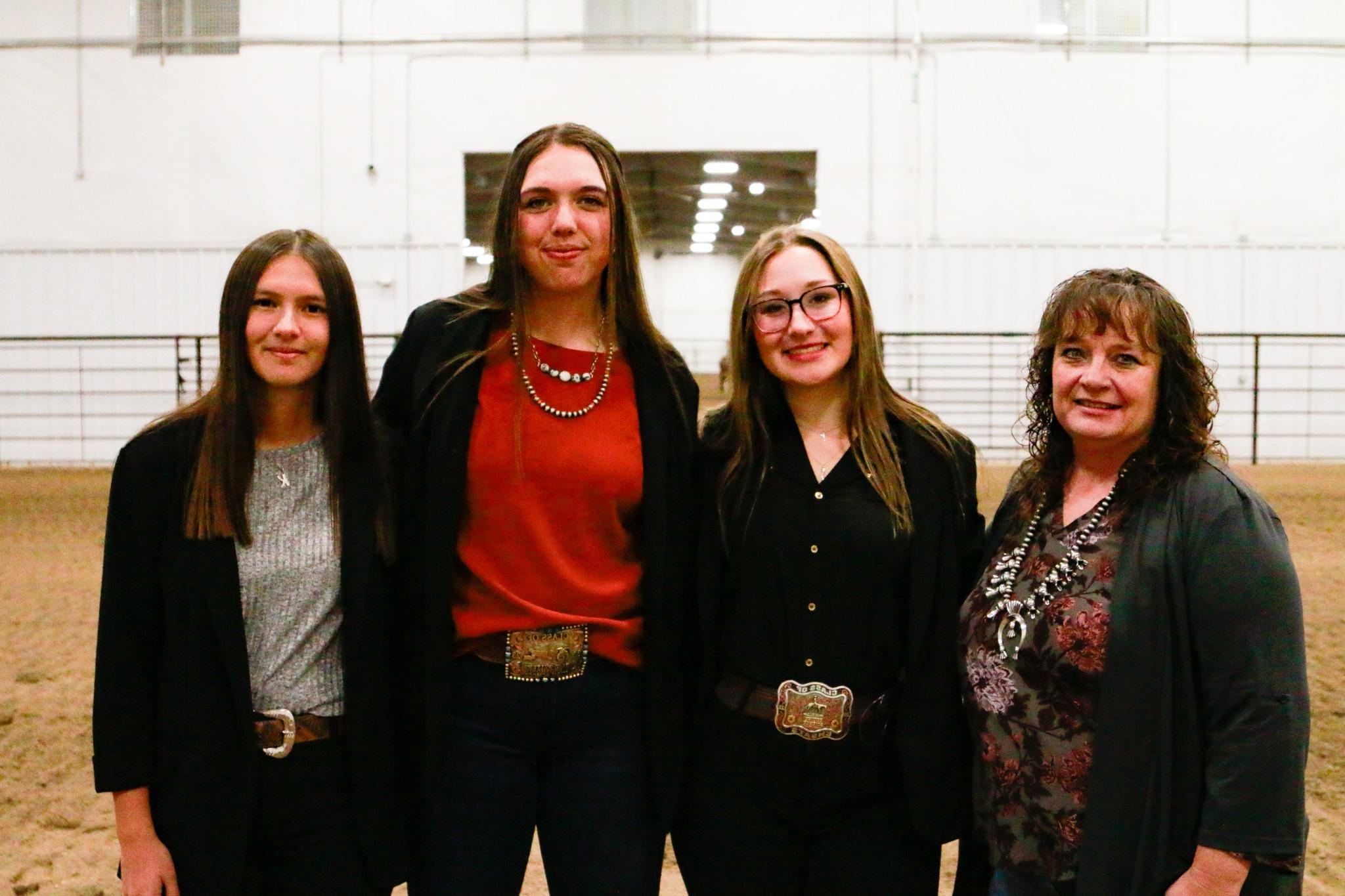 Photo of livestock judging team: coach and students